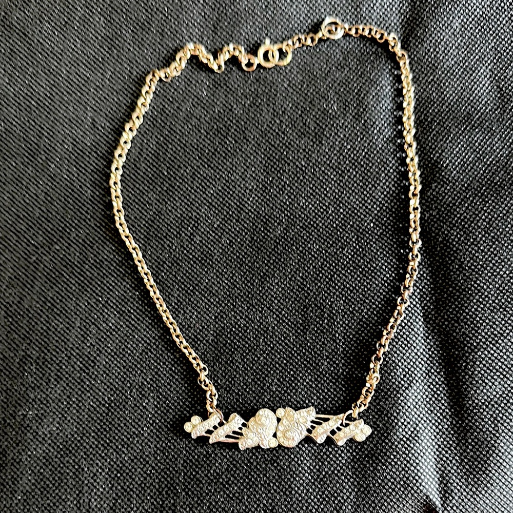 MADE INTHE DEEP SOUTH necklace. Antique chain with antique rhinestone pin.
